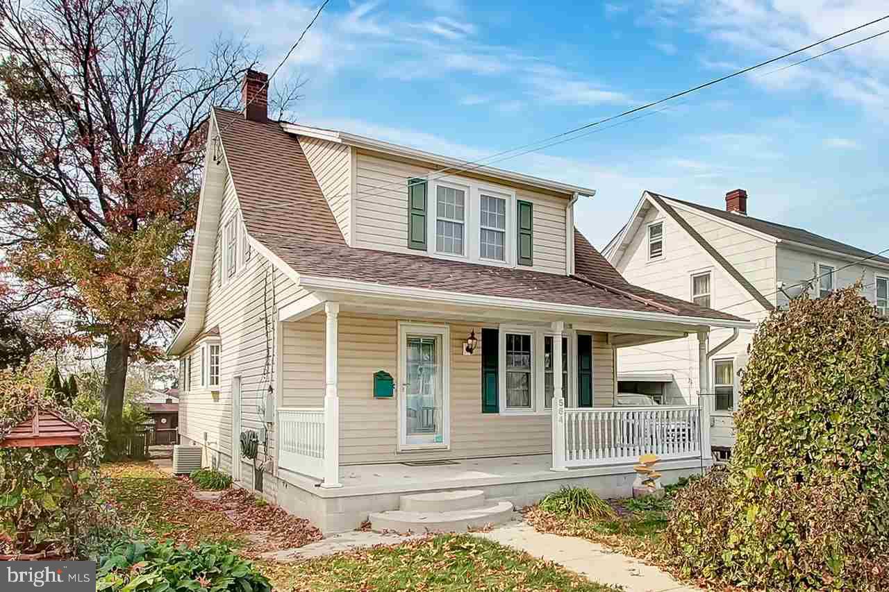 Sweet Cape Cod home features 3 bedrooms, 2 full baths, wood floors, knotty pine cabinets in kitchen, upgraded counter tops and pantry. Large dining room/living room combo with gas fireplace. 1st floor master suite with full bath. 2 bedrooms upstairs with wood floors and full bath. Updated roof, vinyl siding, insulated windows, gas furnace, CAC. Multi level deck overlooks inground pool. This property is being sold "as is".