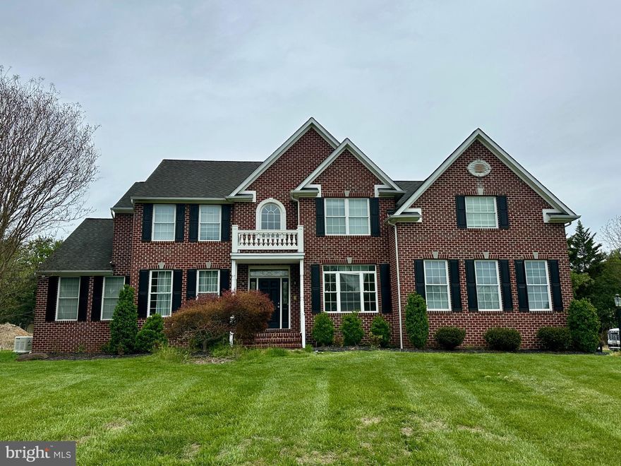 Welcome to 8 Noah Court, set on two private acres and offering over 6,200 square feet of beautifully designed living space. This impressive Colonial combines timeless style with modern comfort, complete with the convenience of an in-home elevator. The main level features a formal living room, elegant dining room, private study/office, and a main-level bedroom, ideal for guests or flexible living. The spacious kitchen is equipped with 42" cabinetry, stainless steel appliances, and a bright breakfast area that opens to the inviting family room, creating a seamless flow for everyday living and entertaining. Just off the kitchen, step outside to a custom paver patio with LED lighting, overlooking a peaceful and private backyard. Upstairs, you’ll find four generously sized bedrooms and three full bathrooms. The primary suite offers a relaxing sitting area and a large en-suite bath. A secondary bedroom features its own private full bath, while the remaining two bedrooms share a beautifully renovated hall bath. The finished lower level provides even more space to unwind and entertain, with a large family/rec room, dedicated media room, and convenient walk-up access to the rear yard. Ideally located for commuters, this home offers easy access to major routes including MD-26, Route 99, I-70, and I-695. Schedule your tour today!