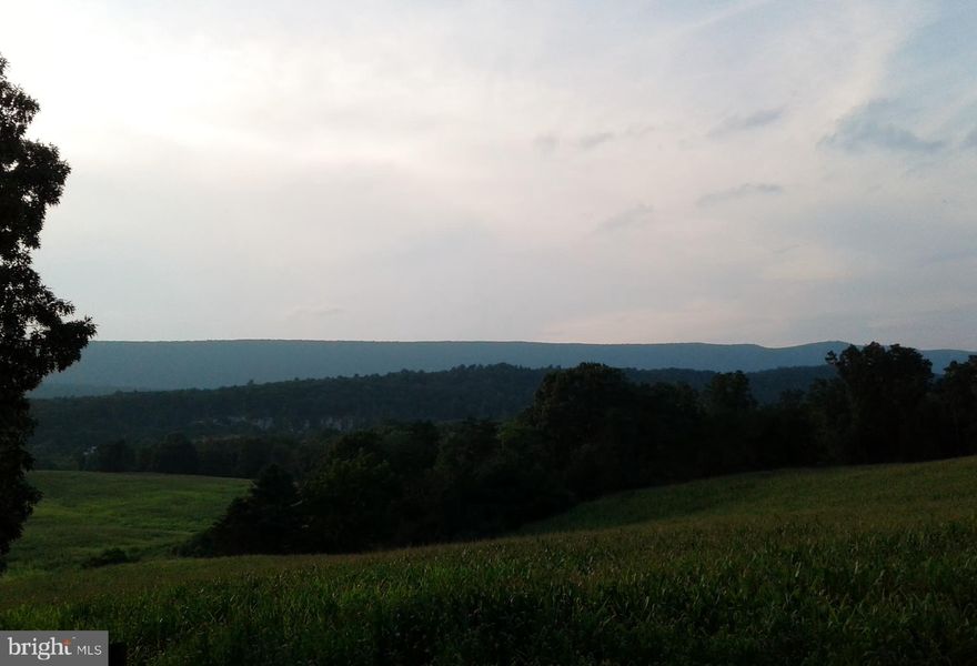 Enjoy a Beautiful view of Cacapon Mountain from this large 3.00 Acre parcel just seconds from Cacapon State Park. One of only Two remaining parcels available with limited restrictions, and not in a subdivision. Well and Septic Approval Letter obtained.