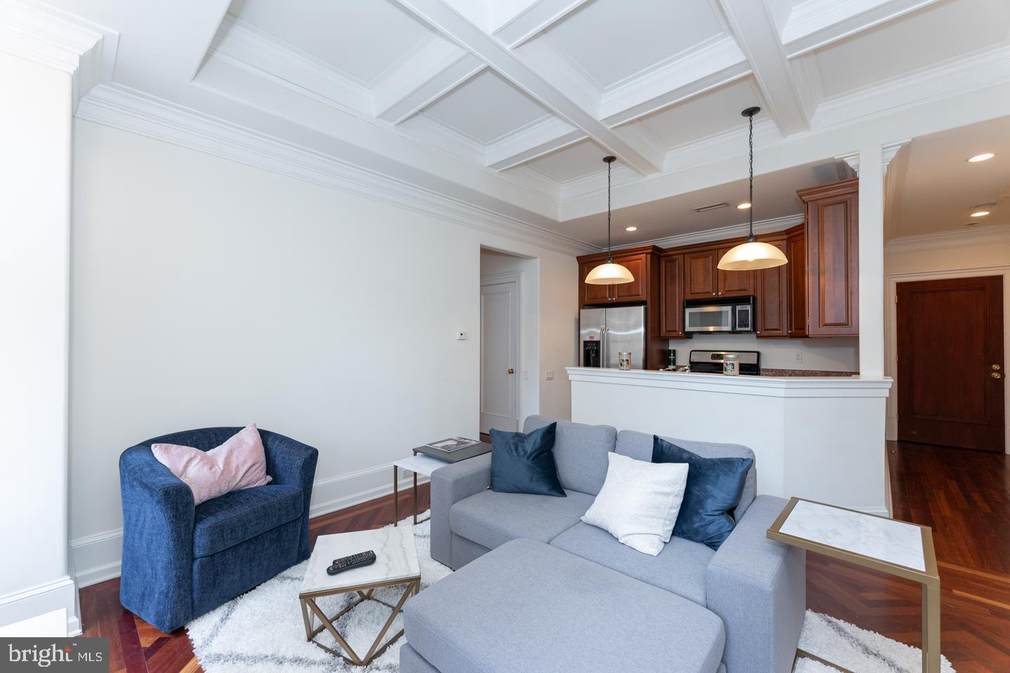 Beautifully upgraded one bedroom, one bathroom at The Barclay on Rittenhouse Square. This designer one bedroom offers custom finishes, coffered ceilings, and Brazilian cherry herringbone hardwood floors. The foyer has a large coat closet and leads into the open living room with two large windows boasting ample natural light. The kitchen has been updated to feature stainless steel GE appliances and granite countertops. The bedroom is generously sized and enjoys excellent closet space and a luxurious bathroom with marble countertop and flooring, white subway tilework, and a shower/tub. There is a washer/dryer. Residents at The Barclay enjoy a twenty-four hour doorman, fitness center, chauffeur driven Mercedes, on-site management, and individually controlled heating and air conditioning. Stephen Starr's Barclay Prime steakhouse is located on the building's ground floor.