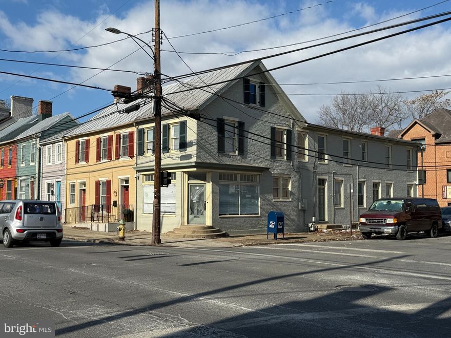 Prime High-Visibility Corner Property in Frederick’s Historic District. Look no further—this golden opportunity offers approximately 2,500 sq. ft. of versatile space, ideal for retail, office, or residential use. The main level features a spacious retail area, office, reception space, and a dedicated conference room. The second level provides flexibility for an apartment, owner’s living quarters, or additional office space—your choice. Includes a kitchen and restroom, plus large windows that fill the space with natural light, creating an inviting atmosphere.
Zoned DB, allowing for office, retail, and residential use, this high-visibility gem is located just steps from downtown attractions, dining, and shopping. Don't miss this rare investment opportunity.