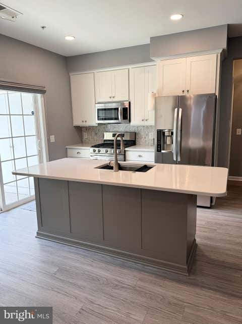 Photo of 1405 Wigeon Way #101, GAMBRILLS, MD 21054 (MLS # MDAA2153136)