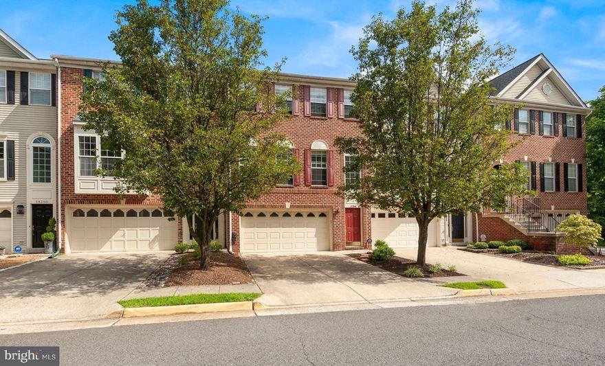 Welcome to a beautiful townhome with 3 level extension! Open space with natural light with many windows* Inviting gourmet kitchen with beautiful granite countertops and SS appliances* All hardwood  floors on main and upper level* Luxurious master bathroom with nice soaking tub to relax*  Beautiful engineered hardwood floor on lower level* Relax and enjoy on the deck looking out to trees* Fenced in with nice landscaped patio with slate stones*MUST SEE!