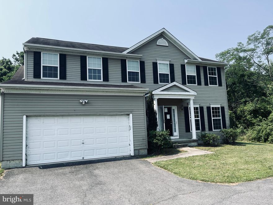 Wonderful opportunity to own this value priced home in the waterfront community of  Walnut Point.  Home features a large living room, formal dining room with coffered  ceiling, nice sized kitchen with granite countertops and tile floors and spacious four bedrooms in the upper level including  the large primary room that has 2 walk-in closets and cathedral ceiling.  The master bath has dual vanity, whirlpool tub and separate shower. This property may qualify for Seller Financing (Vendee).  If Property was built prior to 1978, Lead Based Paint potentially exists.