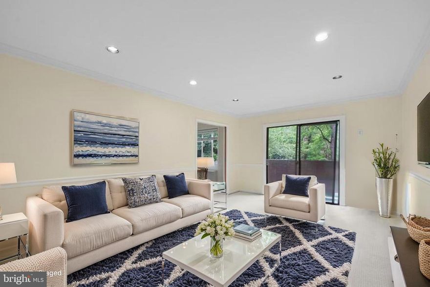 This beautifully updated two-bedroom condo blends modern sophistication with cozy comfort, offering the perfect place to call home. Elegant hardwood floors flow throughout, creating a seamless and inviting atmosphere. The spacious living room opens to a private, sun-drenched balcony—ideal for unwinding or entertaining. The chef-inspired kitchen is a true highlight, featuring sleek stainless steel appliances, stylish cabinetry, and luxurious granite countertops, designed to inspire culinary creativity.

Nestled in the highly coveted George Mason Village Condos, this home grants access to exceptional amenities, including additional storage space, a sparkling pool, scenic nature trails, and peaceful picnic areas—perfect for outdoor relaxation. With its prime location near Barcroft Park, top-rated schools, and a variety of dining and shopping options, you'll enjoy unparalleled convenience and a vibrant lifestyle.

Don’t miss out on the chance to make this exquisite condo yours. Schedule a tour today and experience firsthand all that this stunning home has to offer!