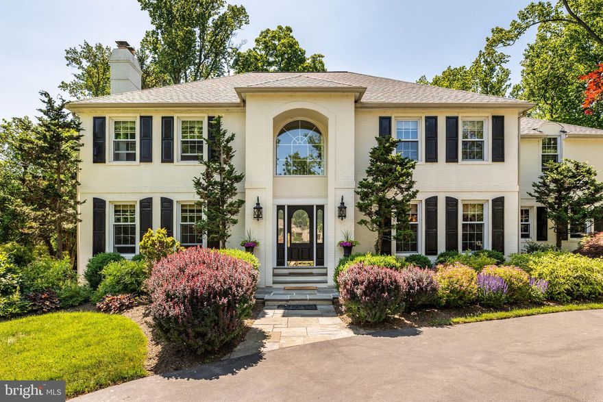 Located on one of the most beautiful streets in Devon, this stately home combines all the elegance and charm of the Mainline. The circular driveway and lush landscaping are the perfect backdrop to the dramatic entrance with flagstone steps. You almost feel as though you are entering a European villa as you stand outside the front door. It is easy to picture your guests entering the grand foyer with its sweeping staircase. Notice the detailed millwork throughout the home and two coat closets. To your right is the formal dining room, large enough to accommodate seating for twelve. To your left, step down into the formal living room with a gas fireplace and pristine oak flooring. What a beautiful room! Straight ahead leads to the heart of the home, a magnificent kitchen and family room. This versatile gathering space is ideal for entertaining. Whether you are hosting a party or just a tv night at home with the family, this is the room all will gravitate towards. This spectacular room includes a tray ceiling, multiple built-ins throughout, surround sound, window seat with drawers and a floor to ceiling double-sided stone wood-burning fireplace. A wall of windows overlooks the backyard and sliders lead to the patio. Two different areas of the room can be used for casual dining. The current owners love dining in front of the fireplace in the winter. Step up into the chef’s kitchen with custom cabinetry, granite countertops, Thermador appliances, Sub Zero refrigerator and wine fridge, two Bosch dishwashers, a coffee bar, wine bar, large pantry and informal counter seating. Located off the kitchen is a powder room, a laundry area with a built-in desk, a “doggy bath” for the resident pooch, access to the patio and backyard and a back staircase. A mudroom features five lockers and a window seat with storage and easy access to the three-car garage and driveway. There is a place for everything in this organized household! Another powder room and very private office with a gas fireplace and bright windows are off the family room. Not to be missed is the covered flagstone patio overlooking the stunning park-like setting of the expansive fenced backyard with mature trees and flower beds. There is also a storage shed for gardening tools and machinery. Sitting on this patio with a glass of wine in hand and something on the grill, is the ultimate relaxing summer evening! Upstairs is the primary suite, resplendent with a built-in bookcase, fireplace and luxurious ensuite bathroom with heated tile flooring, double vanity and steam shower. You will not be able to live without the “his and hers” walk-in closets with built-ins and the dressing/makeup vanity with drawers. Truly a luxurious retreat! Down the hall, there are four other well-appointed bedrooms with large closets, each room delightful in its own way. All rooms have ceiling fans. Two rooms share a double vanity bathroom with a glass-enclosed shower. A bonus room between these rooms is ideal for a study area, yoga space or just extra storage. A hall bath with a double vanity, tub and heated tile flooring completes the floor. The finished basement is large enough for a workout/play/gaming area. A large cedar closet is ideal for winter clothing storage and there is a full bath with a shower. All utilities are housed in the basement with plenty of additional storage space.  A whole house generator is included. The home is located near major commuter routes, train stations, golf courses, shopping and restaurants. Even though you will be in the award-winning Easttown School District, there are also many outstanding private schools in the area. Do not miss this very special opportunity to own one of the Mainline’s finest!