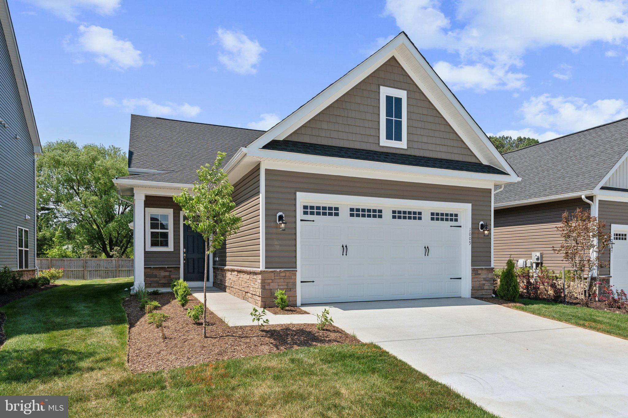 This brand new Douglas with main level living is Ready for Move In!
Step inside the foyer to a bright open floorplan with 10' ceilings! The heart of the home is a chef's dream kitchen, with Gourmet Stainless Steel appliances, white cabinets and quartz counters. The rear of the home is the family room which leads to the screened in porch, perfect for relaxing. The primary bedroom has been extended for additional space and has an en-suite bath with double vanity. Oak stairs lead to the 2nd level where there is a loft, 3rd bedroom and 3rd full bath.
Located in Lakeside at Trappe, a vibrant lakeside community with a plethora of amenities and ideally located on Maryland's Eastern Shore. Lakeside at Trappe is a private retreat to live, work, and play all in one place. Community currently offers a pool, An immersive lakeside experience is in the works, bathhouse with fitness room, ping pong, corn hole and Bark park. Playground and racquet sports courts planned to open soon with an immersive lakeside experience also in the works!