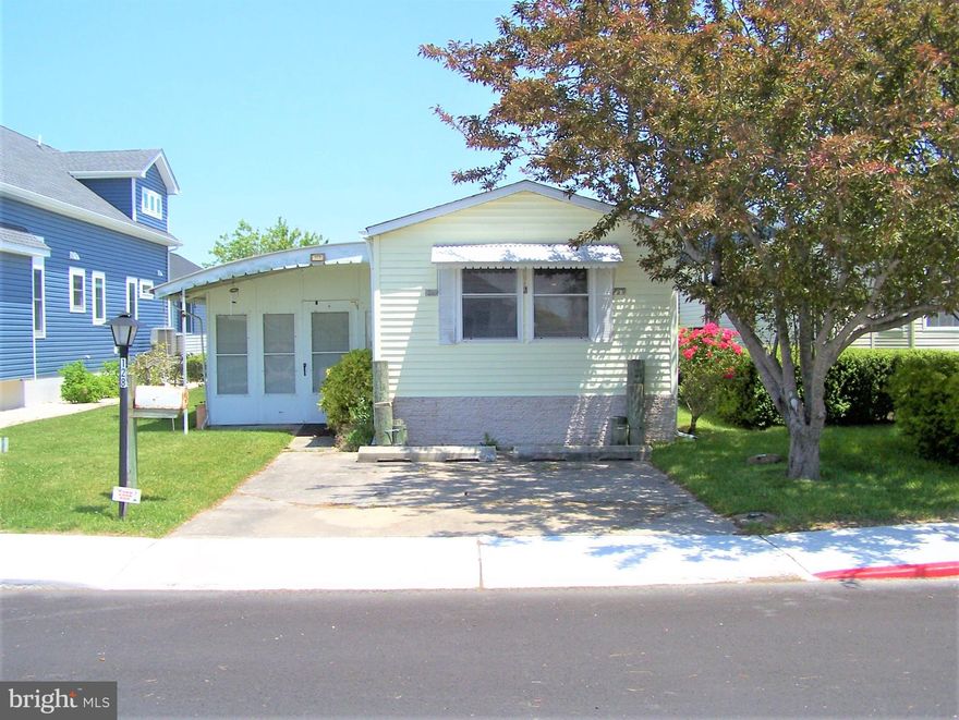 Located in the highly sought after community of Montego Bay in quiet North OC, this 2 bedroom 1 bath home is within walking distance to shopping, dining, bus stop, the beach, all community amenities, and Ocean City's 58 acre Northside Park...home of the 4th of July Fireworks!
 Home features a large enclosed porch with indoor/outdoor carpeting which makes lots of extra space for your family and friends to gather. Community amenities include 2 inground swimming pools, 1 kiddie pool, 2 tennis courts, pickle ball courts, shuffleboard court, 9 hole mini-golf course, 8 acre wildlife sanctuary/park area with 5 acre pond and a blacktop walking/jogging trail, and a bayfront boardwalk with 3 fishing/crabbing piers...all for a low HOA fee of $396.00 a year!!