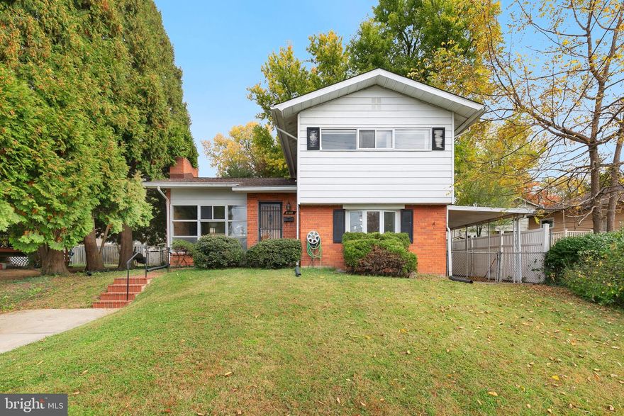 *** WE'RE BACK - AND BETTER! ***
Welcome to Twinbrook Forest, where convenience meets opportunity! This four-level split-level home in one of Rockville's most desirable neighborhoods is brimming with potential and modernized essentials. Just 10 minutes from Rockville Town Square and the Metro Station, you’re also steps away from a vibrant selection of international groceries and dining options.  Lovingly maintained by its long-time owner, recent updates include a new water heater (Nov. 2024), newer roof (2021) and HVAC system (2021). Hardwood floors and a cozy wood-burning  fireplace grace the main level, and large, light-filled windows enhance the home’s welcoming ambiance. The eat-in kitchen is delightful and boasts newer vinyl plank flooring.  The spacious primary bedroom comes with a walk-in closet and abundant storage space.  Outdoors, you’ll find a spacious carport and a private, fenced backyard with mature trees—ideal for relaxation or entertaining. With a little TLC, this home, this home is the perfect blank canvas for your creative vision, whether it’s an upgrade or expansion. Convenient street parking adds to the ease of daily living.  Don’t miss the chance to make this hidden gem your own!