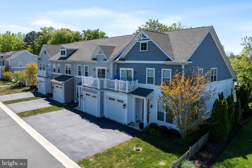 EASY COASTAL LIVING is yours in this beautifully maintained 2018 interior townhouse located in the desirable Tidewaters community of Ocean View. This maintenance-free property offers true peace of mind, with the HOA covering all exterior upkeep, including landscaping, lawn care, trash removal, pool maintenance, gutter cleaning, pressure washing, and even sprinkler system maintenance. This thoughtfully designed home features 3 bedrooms, 2 bathrooms, including a first-floor ensuite primary bedroom, a one-car garage, and a second-level terrace perfect for relaxing or entertaining. Inside, you’ll find an expanded floor plan highlighted by sustainable hardwood flooring, 9-foot ceilings, and lots of natural light from four-panel center-opening sliding doors. The kitchen is a standout with upgraded quartz countertops, 42” Timberlake cabinets, Whirlpool stainless steel appliances, and Moen fixtures. A custom-built mudroom organizer adds everyday convenience, while stylish touches like a beautiful kitchen accent wall elevate the space. Energy-efficient features include a Wi-Fi digital thermostat and Ply Gem double-hung Low-E vinyl windows filled with Argon gas. The home has been extensively refreshed with interior painting throughout, downstairs (except the primary bedroom), stairway, loft, and upstairs bathroom all completed in 2024. Additional upgrades include an electric fireplace with mantel installed in 2025 on its own dedicated circuit, a new refrigerator with ice maker, Ring doorbell, and SimpliSafe security system. A 2-10 one-year Supreme home warranty is included for added peace of mind. Enjoy low-maintenance living with access to a community pool and an unbeatable location, just a short walk to Bonkey’s Ice Cream, mini golf, restaurants, playgrounds, and the FREE trolley. Centrally located only 1.5 miles from downtown Bethany Beach and close to shopping, this home truly offers the best of coastal convenience and lifestyle. Schedule your showing today before it’s gone!