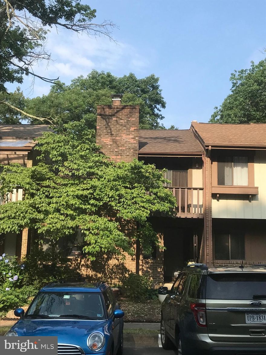 This is one of the largest townhomes in Newington Station. 3 Levels with 3 Bedrooms and 3 bathrooms and includes a wood-burning fireplace backing to woods.  Two assigned parking spaces. A new roof was installed in  2021 with architectural shingles and has a 50-year warranty. Repairs and upgrades were made to both inside and outside A/C units in 2008 & 2013. The seller needs a Rent Back.