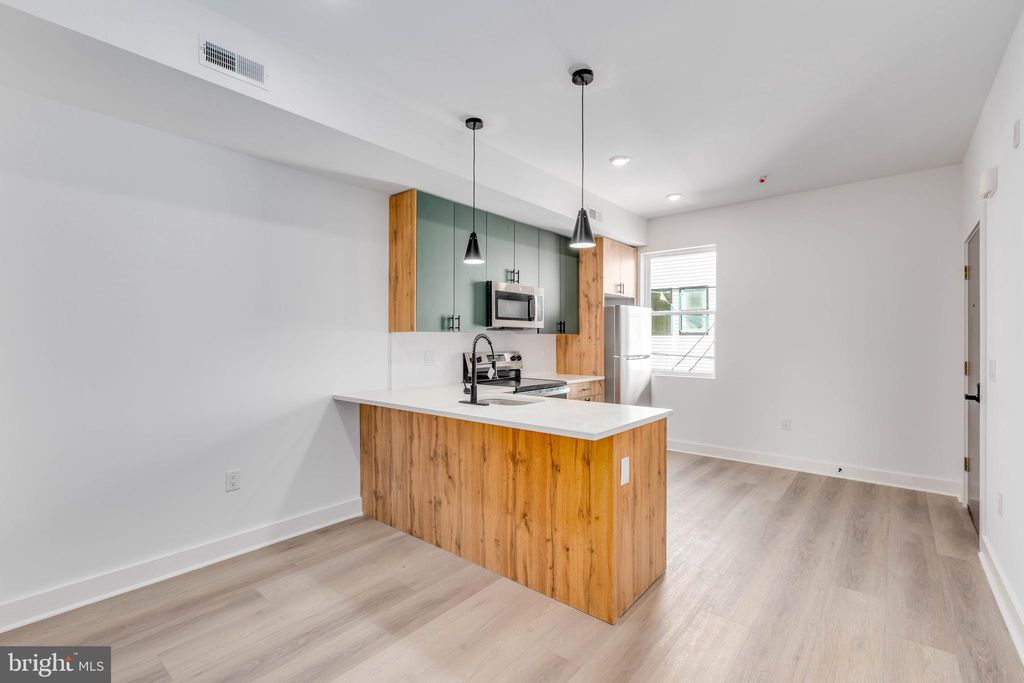 Photo of 1221 W Lehigh Avenue #C, PHILADELPHIA, PA 19133 (MLS # PAPH2569302)