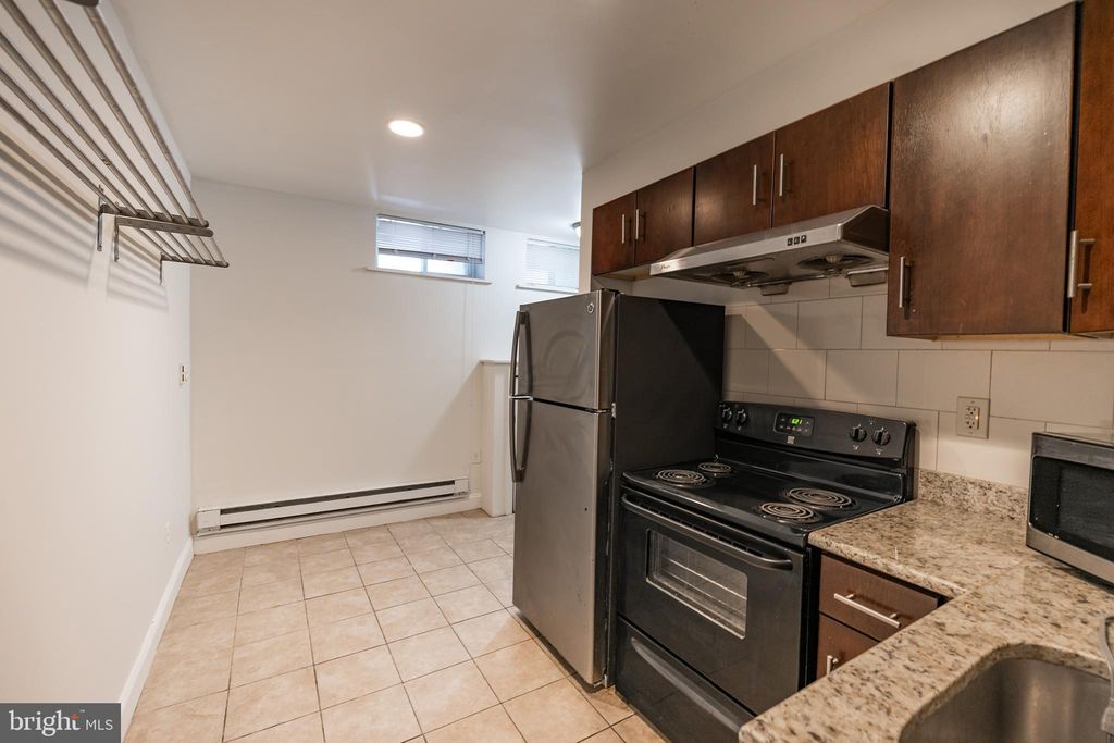 Photo of 1927 N 9th Street #UNIT A, PHILADELPHIA, PA 19122 (MLS # PAPH2567954)