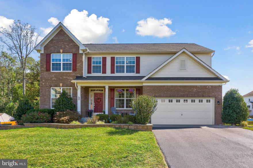 Welcome home to this stunning beauty in the estate section of Kingswood! The charming brick-front Colonial invites you in with its warm curb appeal and a covered front porch, perfect for unwinding on those cozy evenings.

Step inside to discover a versatile office or flex space, an expansive dining room ideal for gathering loved ones, and a spacious family room featuring a gas fireplace that flows seamlessly into a welcoming kitchen. Here, you'll find a generous island and attached dining area, making everyday meals and entertaining a joy. Just off the garage, a thoughtful built-in area offers hooks, spots for shoes, and handy cubbies to keep things organized. The convenient laundry room comes complete with shelving for added ease.

Upstairs, a delightful loft area serves as a second family room or a peaceful spot for kids to tackle homework. Retreat to the luxurious owner's suite, boasting a tray ceiling and ceiling fan for ultimate comfort. The spa-like bathroom invites relaxation with a generous soaking tub, a glass-enclosed shower, a large double vanity, and an enormous closet. Neutral tones throughout provide a blank canvas for your personal style.

The lower level is a wonderful extension for hosting overflow guests or parties, with an extra family room, a flexible bonus room, a private bedroom with its own full bath, and ample storage space. Plus, it walks out directly to the backyard for effortless indoor-outdoor living.

Outside, your private oasis awaits! Enjoy a massive deck for al fresco dining, steps leading down to a beautiful stamped concrete patio complete with a fire pit for memorable evenings under the stars. The fully fenced yard ensures privacy and peace, while a cute shed provides extra storage for all your outdoor essentials. This home is ready to embrace your family's story—come see it today!