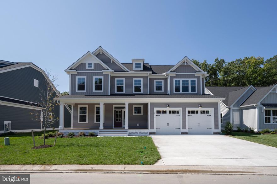 Newport: -Standard 2 story home
Welcome to EAST GATE, a well-appointed community of 88 new, luxury semi-custom single-family homes located in the Fenwick Island, DE & Ocean City, MD area. East Gate offers beautiful spacious homesites backing up to a large community pond with water feature, or tree lined rear yards, and can accommodate *3-car garages!!  The community offers a pool, pool house, pickleball court and community fire pit gathering area. Elevate your lifestyle with The Newport, a 3 bedroom / 2.5 bath to be built floorplan available at East Gate by Foxlane Homes. One of the largest homes offered, the Newport greets you with a grand 2 story foyer entrance, a  formal living room, that lead to an open-concept layout, featuring a large open kitchen, expansive living space with a 2 story great room, and lower-level owners suite designed for ultimate comfort. Upstairs enjoy a large bonus room and multiple guest bedrooms with a full bath for friends and family visiting you at the beach. Not to mention the large unfinished storage area for all the things you need to tuck away. The Newport can be customized for up to 5 bedrooms & 4 full bathrooms. This is more than a home; it is an opportunity to shape an active coastal lifestyle in a premier community. Enjoy a home where craftsmanship meets luxury creating comfort in every square foot. Secure your place today in this exclusive enclave where every moment is an opportunity to experience the extraordinary. *Base pricing includes standard builder finishes.