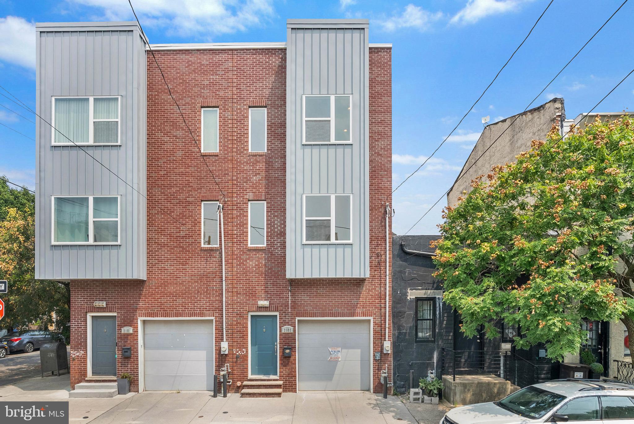 Welcome to this beautiful 3 bedroom, 2 bathroom home with a private on car attached garage, perfectly situated in the heart of Fishtown. Step inside to a bright and spacious main level featuring a comfortable living area and a stylish eat-in kitchen complete with stainless steel appliances, granite countertops, and generous cabinetry. Hardwood flooring, soaring ceilings, and oversized windows are found throughout the home. Upstairs, the second floor offers two graciously sized bedrooms, each with ample closet space, and a full hall bath adorned with ceramic tile and elegant finishes. The top level is a true primary retreat, featuring a walk-in closet and a spa-like ensuite bath with an oversized soaking tub and a separate glass-enclosed shower. The fully finished basement adds valuable living space with tiled floors, and abundant storage. Enjoy the outdoors in your private backyard perfect for relaxing or entertaining. All of this is located on a fantastic block, just a quick stroll to the Berks Station on the Market-Frankford line and some of Fishtown’s most popular dining and nightlife destinations. Taxes and square footage are the responsibility of the buyer to have verified independently.