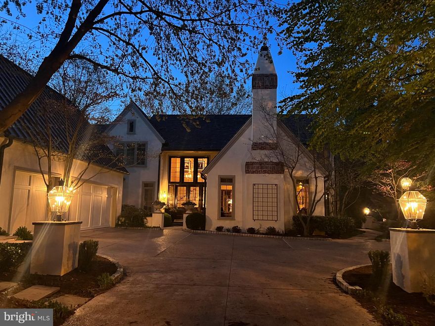 Welcome to Bent Creek, a sophisticated private gated community ideally situated near Downtown Lancaster and the historic charm of Lititz. This exceptional residence located on the most sought-after street in Bent Creek showcases a French-inspired exterior and a timeless architectural renovation by Simeral Construction, blending classic elegance with thoughtful modern enhancements that emphasize superior craftsmanship, enduring quality, and refined living.
A grand two-story foyer sets an impressive tone, featuring rich site finished oak floors, intricate casework, and a statement Chapman & Myers chandelier. Throughout the main living spaces, curated designer lighting—ranging from chandeliers and sconces to pendant and recessed fixtures—creates a warm, sophisticated ambiance. Architectural details abound, including coffered ceilings, wainscoting, crown molding, plantation shutters, Schumacher and Phillip Jeffries wallcoverings, timeless and hand crafted hardware, built-in speakers throughout, and masonry gas fireplaces.
The large family room is inviting and dramatic, offering vaulted ceilings, abundant natural light, Thomas O’Brien lighting, French doors opening to outdoor living areas, and serene views of the first fairway of the newly renovated Bent Creek CC golf course by renowned architect, Andrew Greene. Adjacent to the family room, the breakfast area is highlighted by Ralph Lauren pendant lighting and custom finishes that enhance its charm.
At the heart of the home, the kitchen is thoughtfully designed for everyday living and elegant entertaining. It features mahogany cabinetry with upgraded hardware, concrete countertops, a basket-weave marble backsplash, Sub-Zero refrigerator, double ovens, a separate warming drawer, induction cooktop, a   Miele dishwasher, and carefully selected enhancements that balance beauty with functionality. Handcrafted casework between the dining and living rooms adds architectural interest while subtly defining each space.
The primary suite offers a private sanctuary, complete with a fireplace, screened-in porch, and a spa-inspired bath featuring a Japanese soaking tub, expansive marble walk-in shower, heated marble floors, dual vanities with built-ins, a water closet, and a private laundry room finished with marble surfaces. The massive walk-in closet is outfitted with custom mahogany wood cabinetry and a large center island. A second generous walk-in closet provides abundant storage for shoes, handbags, luggage, and other garments. 
A second bedroom features an en-suite bath with two water closets. The finished lower level further expands the living space with a third bedroom, full bath, and a dedicated fitness room outfitted with professional-grade athletic flooring.
Completing the home is a fully drywalled heated three-car garage with epoxy flooring equipped with built-in speakers, a golf simulator, and a 220-volt Level 2 EV electric car charger. 
The grounds and exterior spaces have been meticulously curated to complement the home’s architectural beauty and natural surroundings. Professionally designed landscaping envelops the property, while the rear patio showcases custom slate hardscaping, enhanced by thoughtful tree removal to maximize outdoor entertaining. Additional exterior features include lighting on timers, built-in speakers, and a gas line for grilling.  The short game practice area and back driving range is only short walk from the rear patio.
Residents of Bent Creek enjoy access to a range of membership options, including golf, tennis, swimming, and social amenities. Conveniently located near shopping, dining, entertainment, and major travel routes, this residence presents a rare opportunity to experience luxury living within one of the region’s most coveted communities. Schedule your private tour today.