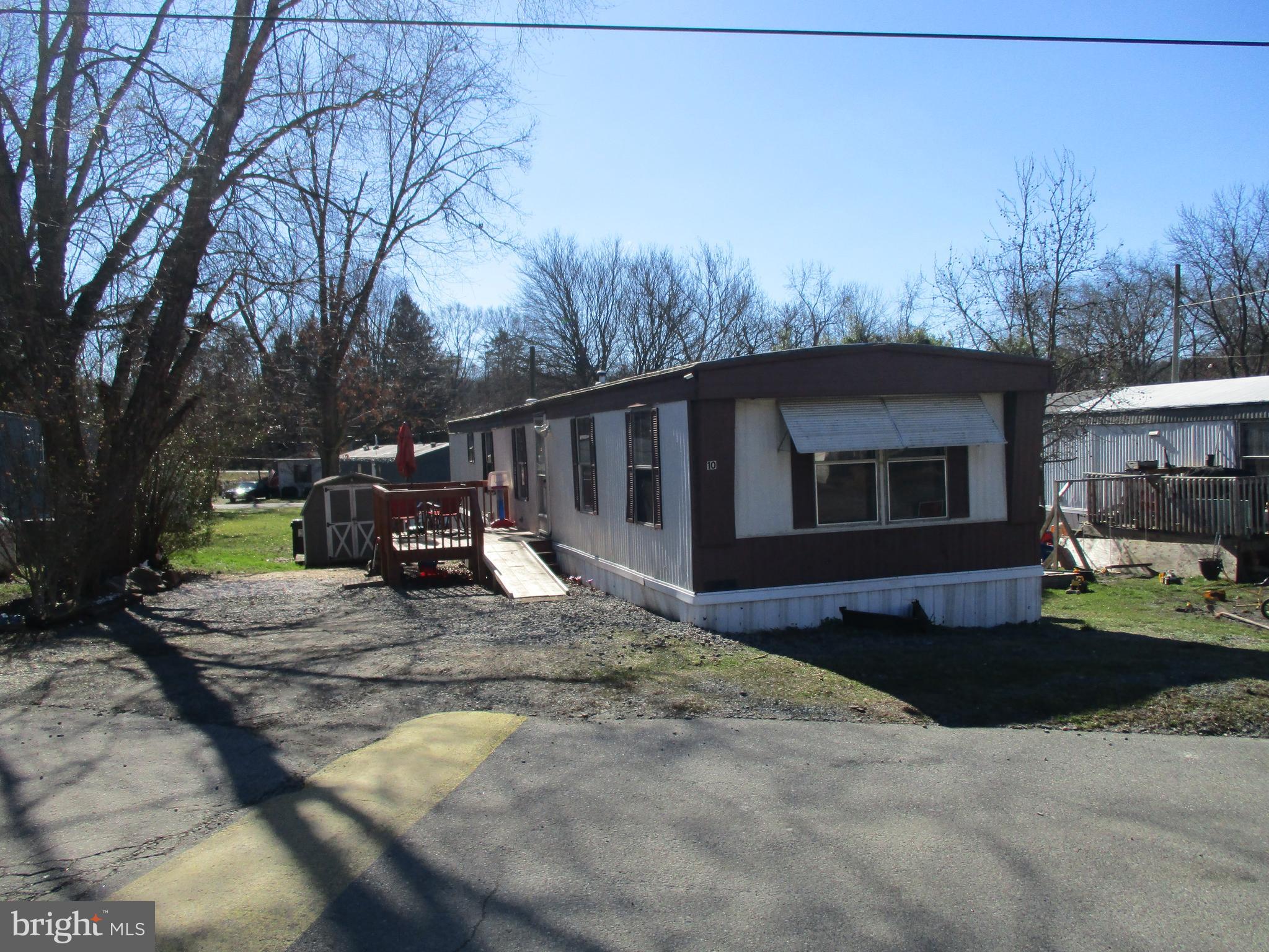 Great Opportunity 4 Bedroom Home In Whispering Pines, Centrally Located Between Elkton & North East, Close To Schools, Shopping, Restaurants, Public Transportation And North East Park & Public Beach! There Are 3 Decks, An Amish Built Shed, Gas Forced Air Heating System For Warmth In The Cold Winter And Two 2-Ton A/C Compressors To Keep You Cool And Comfortable All Summer Long! This Park Has Low Lot Rent Compared To Others In The Area And A Four Bedroom Unit Is Near Impossible To Find! Ground Rent of $650. Per Month Includes Water, Sewer & Trash. Two Pets Are Allowed For A Fee Of $15. Per Pet, Per Month (verify with park manager). Park Application Available Upon Request.
