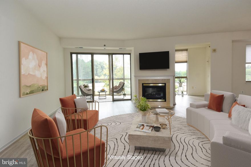 This is a Beautiful Unit!  2 Bedrooms plus Den!  Open floor plan.  Luxury vinyl flooring, Granite countertops, Newer Stainless Steel Appliances.  Beautifully remodeled bathrooms.  Open Floor plan.  Not far from the elevator.  Gas fireplace! Near Norbeck Gate and Club House II.  Brand New Heating and Air Conditioning System!