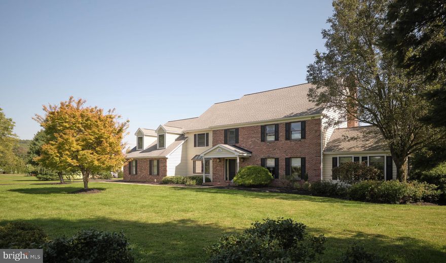 Here is a rare opportunity to own a beautiful, spacious custom home on a quiet cul-de-sac in the sought-after community of Stony Hill Estates. Conveniently located just minutes from Peddler’s Village, New Hope, Newtown, and Doylestown. This 5 bedroom, 3 bath 4600+ sq. ft. Colonial sits on over 2 acres in Solebury Twp., home of the award winning New Hope-Solebury School District. 

This spacious, inviting home boasts a gracious foyer and formal dining room with a bay window on the left and a living room built for entertaining on the right. Through the French doors is an office/study with bountiful natural light streaming through large windows on three walls. The large family room with brick fireplace promotes a natural flow with the recently remodeled eat in kitchen with center island, quartz countertops, white cabinetry and stainless steel appliances. Turn your gaze to the sunroom drenched in natural light with a cathedral ceiling and stone fireplace, and then simply open the door, step outside and you’re on the deck enjoying your morning coffee and taking in the view of the glorious yard that backs up to farmland.

Off the kitchen is a utility/laundry room and a highly desirable first floor living feature: an in-law or au pair suite with a bedroom and full bathroom and easy access to the 3-car attached garage. All the floors on the first floor are hardwood.

Upstairs you will find the large, carpeted primary suite with sitting area, bath with large jacuzzi, walk-in shower and two walk-in closets. Also on this level is a cedar closet, bedroom #3 and bedroom #4 with a completely updated hall bathroom. At the end of the hallway is an extra large bedroom #5 with two closets which could also be a playroom, game room, exercise room - so many options for this bonus room!

The full basement has a Bilko door with access to the backyard and plenty of room for a workshop, exercise area, and lots of space for storage. Don’t miss the opportunity to see this beautifully updated and well appointed home in a wonderful neighborhood, close to restaurants, shopping and entertainment. An easy drive to Princeton, Philadelphia, New Jersey and New York.