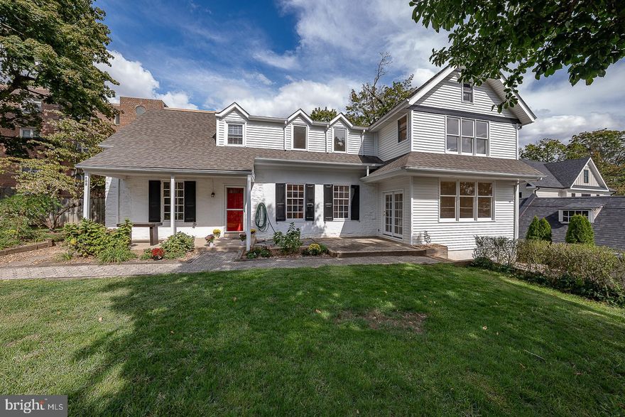 Welcome to 208 Barrie Road, a beautifully updated 4-bedroom, 2.5-bath home offering 3,176 sq. ft. of living space on a quiet private cul-de-sac with 3+ private parking spaces and unbeatable accessibility in sought-after Narberth. Just steps from downtown shops, restaurants, the library, playground, and train, this home combines unbeatable walkability with privacy, space, and charm. Many say it is Narberth’s best kept secret. Step inside the classic center hall, where a coat closet welcomes you. To the left, the spacious living room features custom built-in shelving and a cozy gas fireplace. To the right, the thoughtfully designed kitchen and dining area boasts granite countertops, stainless steel appliances, an oversized island with seating, abundant cabinetry, and a built-in dining bench overlooking the patio and yard. Just off the kitchen, a large family room with large windows fills the home with natural light, while a powder room and laundry complete the first floor. Upstairs, the primary suite offers multiple custom closets and a full en-suite bath. Three additional bedrooms share a nicely updated hall bath, and a full wall of deep and spacious hallway closets provides exceptional storage. The second floor also offers access to an unfinished attic, ideal for even more storage or potential future expansion. The finished walk-out lower level adds 538 sq ft of versatile space, ideal for a playroom, gym, or office, with additional storage closets and direct yard access. Outside, enjoy multiple patios, garden areas, and a side yard perfect for entertaining or quiet relaxation. A storage shed and 3+ off-street private parking spaces complete the property. Located in the award-winning Lower Merion School District (Choice Zone), this move-in-ready home truly has it all: modern updates, abundant storage, private outdoor living, and a prime Narberth location.