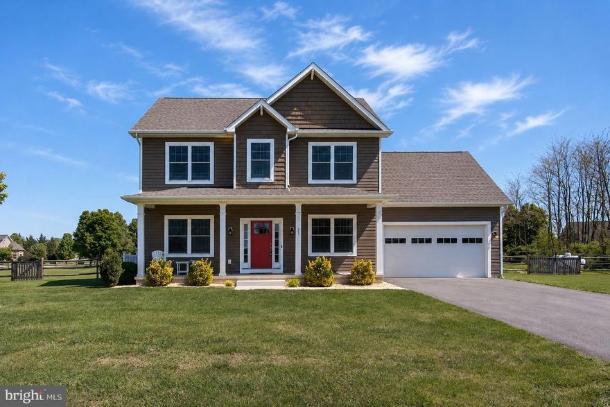 POOL IS OPEN + NEW PRICE—JUST IN TIME FOR SUMMER! Built in 2020 and set on a beautiful, flat 1.01-acre corner lot, this like-new colonial is ideally located in the highly sought-after Spring Mills School District, offering modern finishes, thoughtful design, and an outdoor lifestyle that truly sets it apart. Inside, the home feels warm, fresh, and effortlessly livable, featuring luxury vinyl plank flooring throughout the main level and decorative paneled walls that add texture, character, and a custom feel. The kitchen is both stylish and functional with gas cooking, a striking tile backsplash, abundant cabinet and prep space, and an oversized center island with seating—perfect for morning coffee, casual meals, or gathering with friends. The kitchen opens to a charming breakfast nook overlooking the backyard and flows seamlessly into the living room, creating a layout designed for connection and entertaining, while a formal dining area just off the kitchen provides additional flexibility for hosting. A main-level bedroom offers valuable versatility and works beautifully as a private home office, guest space, or flex room to fit your lifestyle. Custom-installed blinds and paneled doors throughout the home enhance the clean, move-in-ready feel. Upstairs, you’ll find three additional bedrooms and two full baths, including a spacious primary suite with tray ceiling detail, a spa-inspired bath featuring dual vanities, tile floors, a tiled shower, and a deep soaking tub, along with a walk-in closet. The additional bedrooms are generously sized, and the upper-level laundry is a true, separate laundry room complete with a front-loading washer and dryer that convey. The unfinished basement offers exceptional opportunity with a rough-in for an additional full bath and a walk-up exit to the backyard, allowing the next owner to bring their vision and unlock even more finished square footage over time. Outside is where this home truly comes to life. The lot is framed by split-rail fencing and anchored by a stunning 18x36 heated in-ground pool installed in 2023. The outdoor living space invites you to slow down and enjoy every season, with a heated pool, expansive patio, and open views that make it easy to entertain, unwind, or simply step outside and reset. It’s a space that feels equally suited for hosting and for everyday enjoyment. The pool is heated by an owned 500-gallon propane tank, which also services the gas cooktop, and an owned water softener adds long-term value. With a two-car attached garage, ample driveway parking, and a setting that blends space, style, and outdoor living, this North Ridge home offers a lifestyle that’s hard to replicate—modern, comfortable, and designed to be enjoyed both inside and out. Summer is calling—and this backyard is ready to answer!