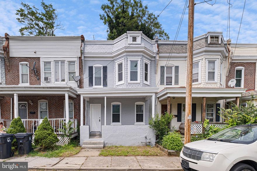 Classic city row home, updated and ready for the next owner! Step in off the front porch to a large living room boasting vinyl plank flooring that spans the entirety of the first floor. The living room offers an open-concept flow through to the dining room, which is flanked by the fully remodeled kitchen. Kitchen updates include brand new white shaker cabinets, granite counters, and stainless steel appliances (including gas cooking on the range and a dishwasher). New carpeting starts at the staircase and runs through the second floor, which is comprised of a large front bedroom (including a bay window), two well-scaled supplementary bedrooms, and a full bathroom. The bathroom has been updated with a new tile tub-surround, updated flooring, and a modern vanity. New paint through the home completes the move-in-ready feel, and a full basement has laundry hook-ups and plenty of room for storage. All this with updated vinyl replacement windows, a gas forced-air furnace, and updated 200AMP electrical panel. Put this home on your tour today!