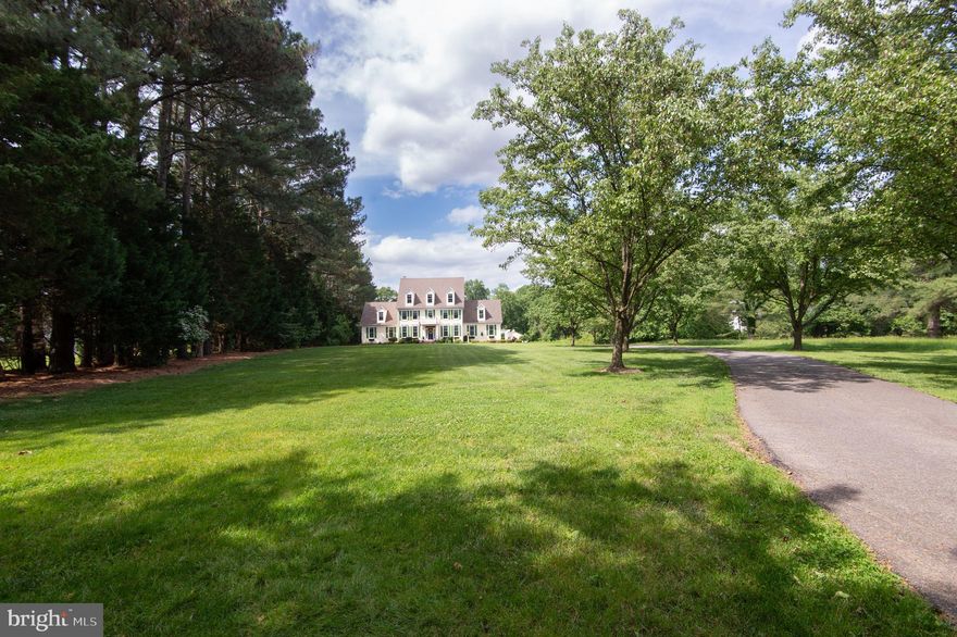 Welcome to this exceptional William Poole–designed Tidewater Colonial, gracefully sited on approximately 2.3 acres in the desirable community of Waverly Island Estates, just three miles from the Town of Easton. Offering a refined blend of classic coastal architecture and modern comfort, this property provides a private retreat on Maryland’s Eastern Shore.

Inside, the home features a well-designed floor plan with abundant natural light and timeless appeal. The open kitchen connects seamlessly to a casual dining and living area highlighted by a vaulted ceiling, creating an inviting space for everyday living and entertaining. Formal living and dining rooms offer elegant settings for gatherings, while the expansive deck, fenced backyard, and in-ground pool extend the living space outdoors.

The first-floor primary suite provides convenience and privacy. Upstairs, you’ll find spacious guest suites, a dedicated office, and a flexible family room ideal for work, relaxation, or hobbies. A large walk-up attic offers excellent storage and future expansion potential.

Ideally positioned within the Oxford corridor, this home allows easy access to the waterfront town of Oxford and the shopping, dining, and cultural amenities of Easton. Enjoy the best of rural living with proximity to modern conveniences, all within a peaceful and sought-after neighborhood.