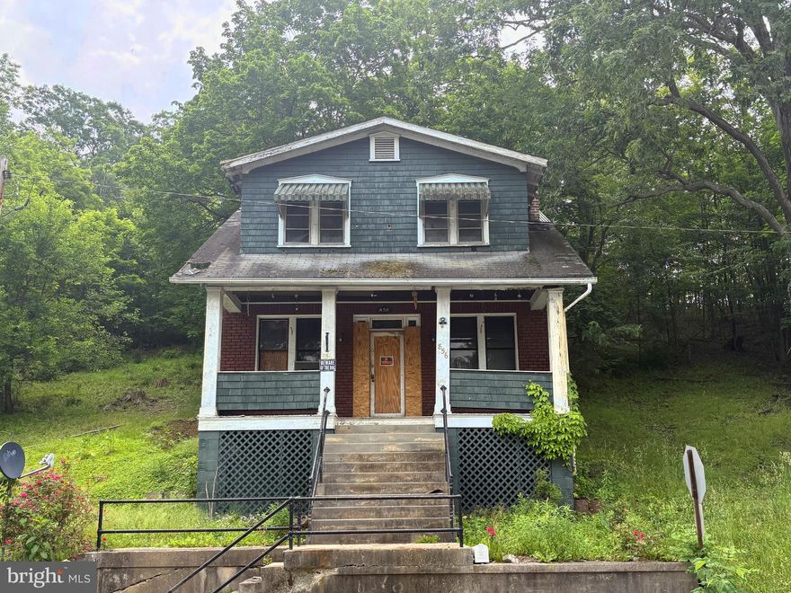 ***BRING OFFERS.*** AS-IS. House needs a significant amount of work. Will not qualify for FHA/VA in current condition. Large rooms, original 1920s period pine flooring on upper level, fireplace, plenty of storage.  With sweat equity and time you could turn this into something nice at a price that can't be matched for a craftsman style home of this size.  Bank owned.