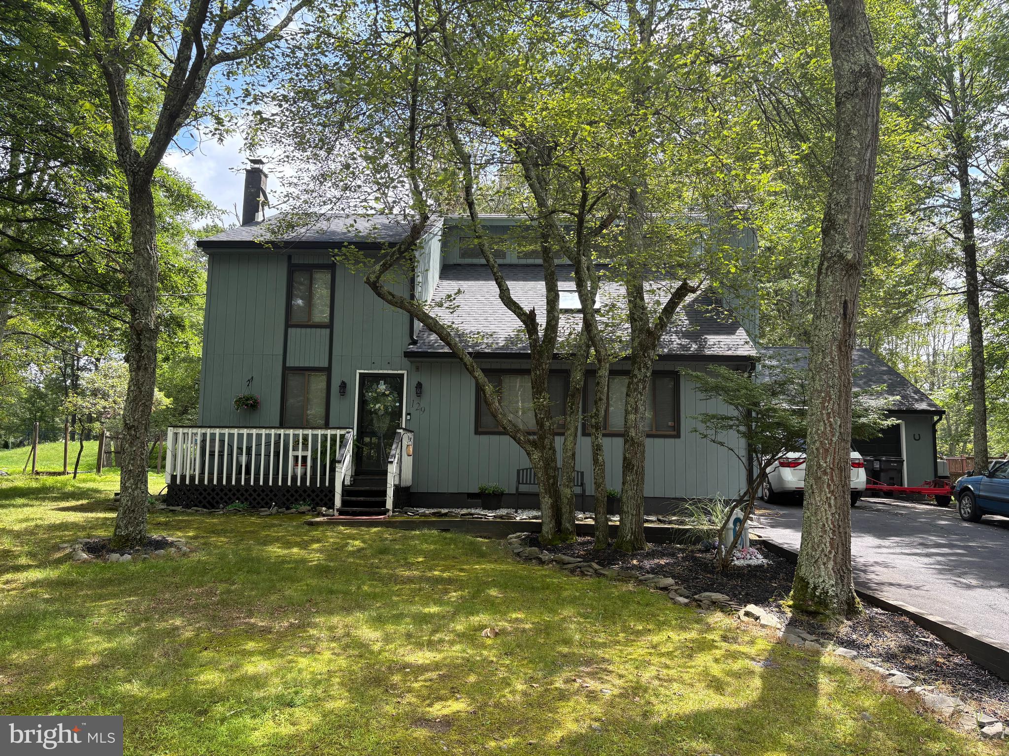 Contemporary home ,built 1990 , 2000sq ft 4 bedrooms and 2 full bathrooms, large 2 car garage with bonus room and drop down ladder attic space , large back yard , oil furnace , propane heater insert, and wood burning stove, new roof , and gutters , new kitchen counter top Granite, ceiling fan's, house Is on quite street , good neighborhood , update bathroom toilet, sinks , gated community with pool, tennis court , baseball and track field, 24 hour security, exercise room, fishing pond, lt