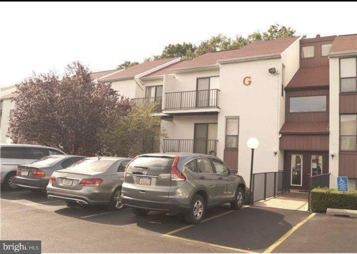 Welcome Home! This turn key home is ready for its new owner. Beautiful 2 bedroom, 2 full bathroom first floor condominium available for you to simply unpack and enjoy. One of Carousel Station's finest 1st floor condos situated in a pristine community steps away from the R-3 Regional Rail and minutes from being in Bucks and Montgomery County, also within walking distance of many bus routes\stops and convenient shopping . Enter in to the main foyer entrance with double coat closets, leading into a sunken living room w/9ft ceilings and a wall of windows looking out over your private walk-out patio. The unit includes new hardwood throughout kitchen, living, dining and bedrooms, new laminate and tile in other rooms such as bathrooms and foyer area, loads of closet space and neutral paint. The kitchen offers newer countertops, durable appliances, and light fixtures. Both the main and master bathrooms in this unit have new wooden flooring and fresh paint. The primary bathroom boasts a stand-up shower, neutral tiling and newer vanity. The primary bedroom also has closet space aplenty. New HVAC, like-new washer and dryer, this unit shows its comfort and desirable location, and is well appointed and cared for by the current owner. Amenities include, an Olympic-sized swimming pool, club house, green open land and walking paths, and tennis courts. Incorporated into the association fee are Digital cable with HBO, water usage, building and common grounds maintenance. Don't worry about snow removal any longer!