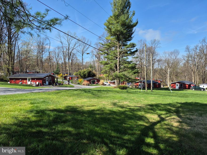 Location, Location, Location. 29.9 acres in Paradise Twp, Lancaster County with 30 cabins on long term rentals, short term rentals in the past (however confirm with township), pond and woodland with lots of potential. Good solid investment, tenant occupied.
