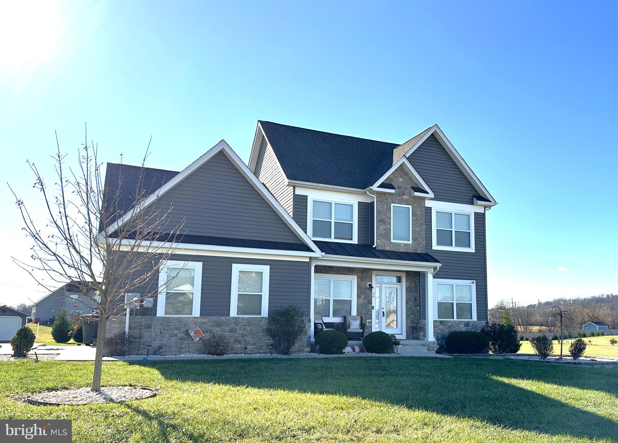 Amazing 5 bedroom, 3 bath home situated on 1.49 acre lot in North Ridge. Features include an open floor plan, spacious rooms, main level bedroom & bath, full walk-out basement with rough in for bath, covered rear porch and a side entry 2-car garage. Country living in a very convenient location! The kitchen features granite counter tops, stainless steel appliances, and a large center island. The attached great room (family room) is huge and can accommodate lots of entertaining! This home is in mint condition and ready for it's next family. Make your appointment today.