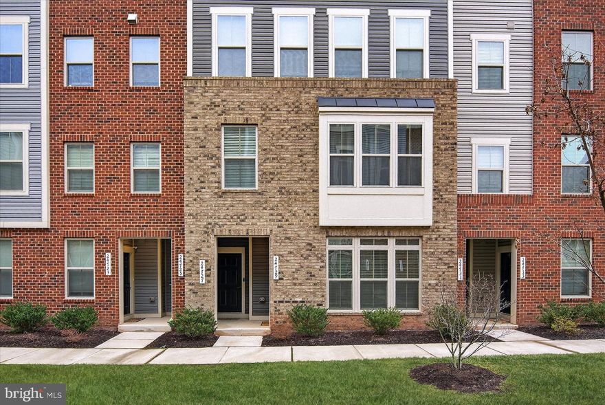 Beautiful Matisse model 1 car garage condo townhome with 3 bedrooms, 2.5 bathrooms, built in 2021. This home has $10,000 home site premium so there is no car parking in front of the house. Sellers has upgraded to all Led lighting throughout the house.  Luxury vinyl plank flooring on main level and in all bathrooms. Main level with recessed lighting, pendants. Kitchen has quartz countertop, double sink, stainless steel appliances with upgraded LG French door refrigerator, GE gas range with center oval burner, Zline Range hood which eliminates all unwanted smoke and grease, GE dishwasher, Pendant & Recessed lighting. All bedrooms have ceiling fans with lights. Primary bedroom has 2 walk- in closets, recessed lights, big window. Primary bathroom has double sink, quartz countertop. Bedroom 3 has access to composite deck/balcony. The bedroom level laundry room with full size, front load upgraded LG washer and dryer, as well as a utility sink. Nest programmable thermostat conveys. Nest security system conveys AS-IS. 
Arcola Town Center offers outstanding amenities including a community pool, tot lot/ playground, dog park, walking paths, meeting room/party room, exercise room/gym. Condo fees include snow removal, trash and water.
Great location with close-by shopping and numerous restaurants. Walmart Super Center, TJ Maxx, Home Goods, Pet Smart and more at nearby Dulles Landing. Easy access to Route 50, Route 28, Route 267, I-66, the Silver Line Metro Station. Quick access to Dulles Airport.