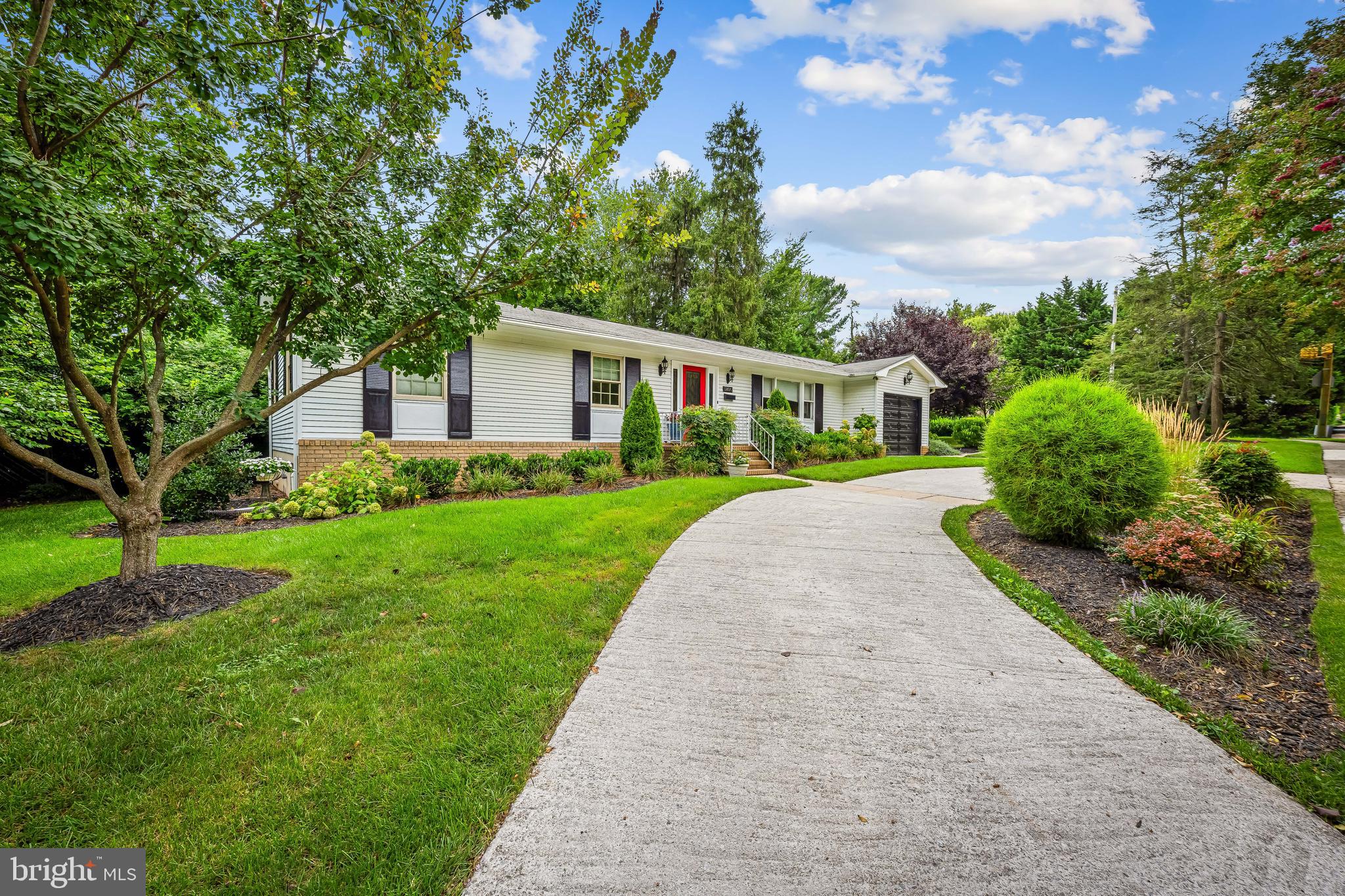 Embrace the new extensive renovations that enhance comfort and style in every corner featuring beautifully landscaped grounds, gleaming hardwood floors, elegant crown moldings throughout the house, and the custom wood wall accents that bring warmth and character into modernized spaces with historic elements added for elegance. If seeking 3-bedrooms, the frosted glass divider doors between two rooms could be easily replaced with drywall. Floor plans are provided to illustrate the opportunity this home offers its owner/s on its first floor and lower levels. This spacious two-level home with its first-floor bedroom suite boasts over 2,800 sq ft of beautiful living space, complete with updated kitchen, bathrooms, details, and lighting. Enjoy the convenience of a circular driveway and an oversized garage with plenty of space for storage. The first floor could serve as a fantastic lavish primary suite with a jacuzzi bathroom, bedroom, additional den/guest bedroom, office, and interior access to large garage for parking and plenty of storage space. The newly renovated lower level with bedroom and bathroom has additional large spaces so could serve as a second large bedroom/bathroom suite with additional space for endless potential uses including home office, playroom, den, recreation, home gym, etc.. This well-maintained home is located within walking distance to many schools, close to shops at Roland Park, Cross Keys, Lake/Falls, Belvedere Square, and the Lake Roland Park. This could be a great choice for parent/s with a child in a school within walking distance, two co-habitants sharing the kitchen but seeking private spaces on different floors, or separate in-law living space with the shared kitchen. Nestled in extensive landscaping that has been planned to beautifully surround the house, the circular driveway adds several extra parking spaces and easy entrance and exit onto Lake Ave. The home was built in 1974 on the NW corner lot of Charles Street and Lake Ave. adjacent to 2 West Lake Ave. so was unable to have the address as 0 West Lake Ave. and therefore was presumably given the North Charles Street address. As you see from the photos, the house view is onto West Lake Avenue. This is a charming home in The Orchards with a rarely available ranch design for ready accessibility. Please come see the home to appreciate the renovation and its opportunity.