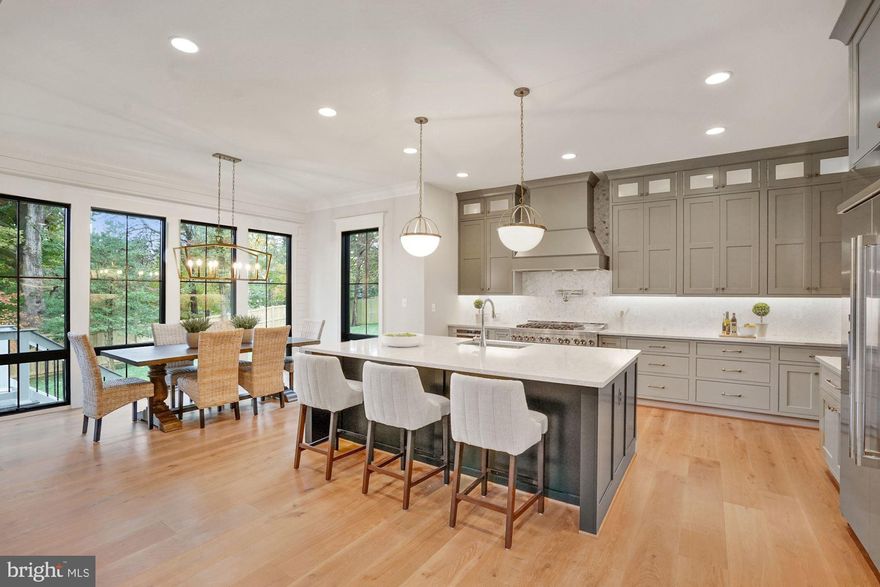 Under construction by Jefferson Homes.  June 2024 delivery.  Rare 15,000 square foot lot in a cul de sac of mostly new homes, walkable to downtown Vienna.   6500 finished square feet with 6 bedroom, 6.5 baths.  No detail has been overlooked  to create a home with aesthetics that will stand the test of time.  Gourmet kitchen with large quartz center island and separate breakfast nook with walls of windows.  Huge walk in pantry.  Family room with gas fireplace opens to Trex decking (optional covered porch available), maximizing your main level entertainment space. Elegant dining room with wall sconces.  Private study. Main level bedroom with full bath.   Large mudroom with door to front porch.   Upper level features a primary suite with tray ceiling and gorgeous bath, three large en suite bedrooms and laundry room. Lower level has walk out rec room, game room, fully loaded wet bar, exercise room, media room and  bedroom with full bath. Gorgeous wide plank wood flooring.  Tasteful design selections made by our award-winning interior designer ensure a cohesive feel.  Jefferson Homes has been building in Vienna for over 20 years, known for attention to detail and high quality construction. Enjoy the pride of ownership and confidence knowing that your new home was built by an experienced and respected custom builder.  Photos are of a recently completed home.