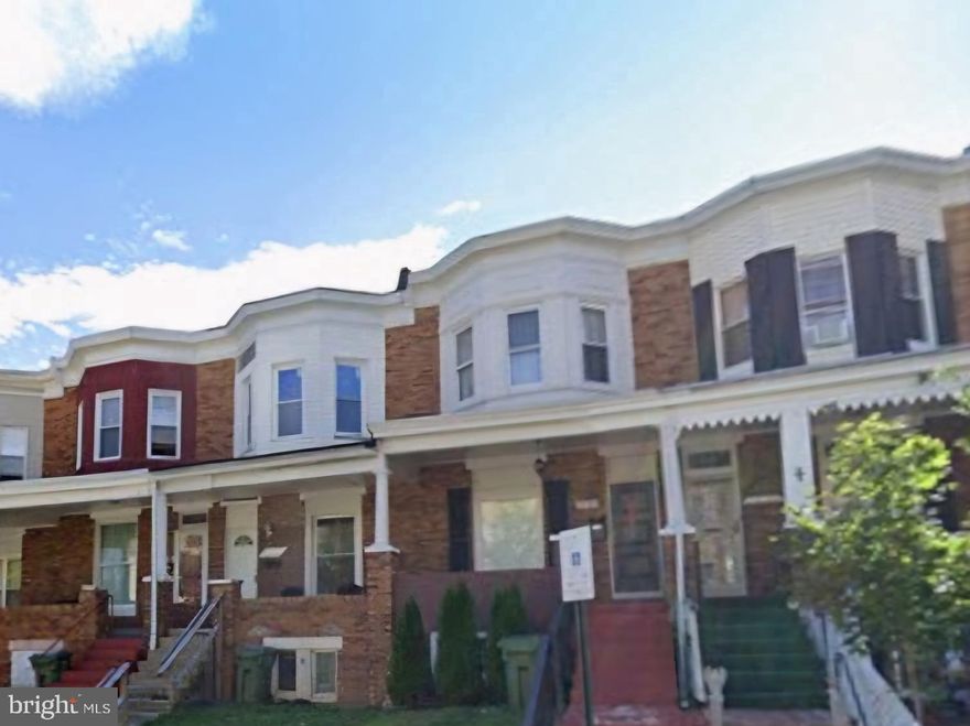 This spacious 3 bedroom 1.5 bath porchfront rowhouse offers tremendous potential. Lofty 9' ceilings in large living rm and separate dining as you enter through the front. Rear facing kitchen with recent refrigerator and a gas range, overlooks the fenced backyard. Many nearby amenities including Sinai hospital, Druid Hill park, Maryland zoo, and transportation. Plenty of investment in the area, lots of opportunity!