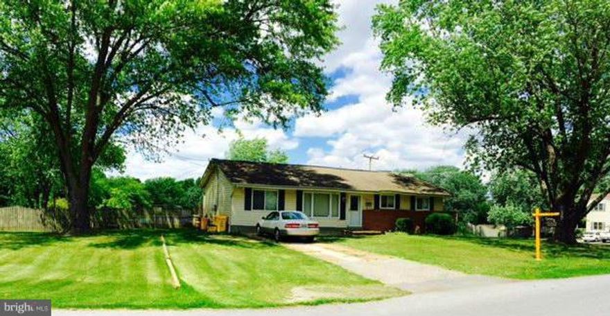 JUST REDUCED 10K.  WOW!!!  1648 SQ FEET OF FINISHED LIVING SPACE ON .62 OF AN ACRE.  HARDWOOD FLOORS IN THE WHOLE HOUSE. UPDATED KITCHEN WITH CORIAN COUNTER TOPS. KITCHEN TABLE SPACE.  UNFINISHED BASEMENT (MOST OF THESE HOMES DO NOT HAVE BASEMENTS). HUGE FENCED BACK YARD.  DECK.