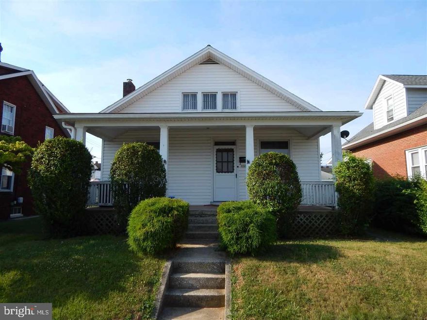 Great opportunity!  Large rooms and wood floors.  One car detached garage and off street parking.  Sold "AS IS"