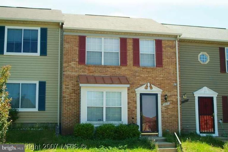 Yard backs to woodlands & is fenced w/shed. Main level slider accesses this area. Enter into the ceramic tiled eat-in kitchen w/pass thru to dining room. Close to shopping, @ restaurants w/ an easy commute to DC or VA. Section 8 Accepted Now. Good credit and good rental history only please