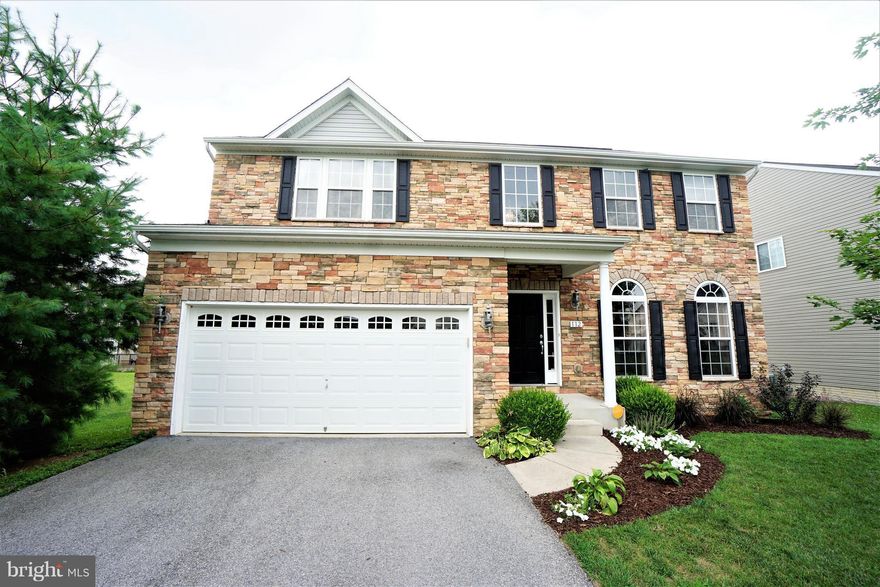 Stunning Stone Front Colonial in Shenandoah Springs. 4 BR 3.5 bath.Open layout w/wood trim details.  2-story FR w/stone gas FP. SS appliances, kitchen island, 42" Maple cabinets, & corian countertops. Upper level Master Suite w/soaking tub, lg glass shower, & cathedral ceilings. Finished LL w/ large Rec Room, full bath & storage/utility room.  Close to Rt 340, shopping, grocery, & restaurants.