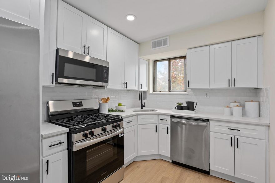 Welcome to your beautifully renovated home in the highly desirable Maryland Farms community of Beltsville! This stunning 1-bedroom, 1-bathroom condo offers the perfect blend of modern upgrades and everyday comfort, ready for you to move right in. Step inside to find a bright, open living space, seamlessly connecting the dining area to a show-stopping kitchen featuring quartz countertops, premium stainless steel appliances, custom cabinetry, and striking finishes. Down the hall, you’ll find a spacious bedroom and a beautifully updated hallway bathroom with modern finishes. Step out onto your private deck with storage closet—ideal for your morning coffee or unwinding on summer evenings. Enjoy the convenience of a secured entry, plus access to fantastic community amenities including a sparkling pool, a tennis court, a clubhouse, and playground. Located just minutes from major commuter routes, shopping, and dining. This is a rare opportunity to own a move-in-ready home in one of Beltsville’s most sought-after communities. Schedule your showing today!