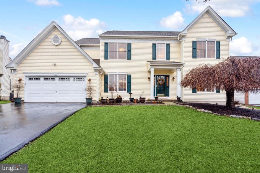 Nestled in the heart of Newtown, this grand single-family sanctuary spans over 3800 square feet, presenting a captivating blend of timeless elegance and contemporary comfort. Boasting 5 bedrooms and 3.5 bathrooms, this residence stands as a testament to refined living.  The allure begins as Brazilian Red Cumura hardwood flooring which graces the first floor.  Crown molding throughout the house adds a touch of classical opulence, while the solid wood turned staircase stands as an architectural masterpiece, overlooking the two-story great room adorned with a majestic floor-to-ceiling stone fireplace.  Adjacent to the great room is optional music/office or study offering easy floor from one room to another.  The kitchen is a culinary enthusiast's dream with a large island, solid wood cabinets, new granite countertops, and state-of-the-art stainless steel appliances, complemented by a subway tile backsplash, under-cabinet lighting and walking in pantry, this space exudes both functionality and style.  Just off the kitchen is the laundry room and mud room, showcasing a new washer and dryer and adjacent nook with built-in seats and storage, seamlessly merging practicality with sophistication. The finished basement offers an additional 1000 square feet with a full bath, engineered hardwoods, plush carpeting, ample storage space, and potentially a 5th bedroom.  The indulgent main bedroom suite awaits, featuring a spa-like oasis with a walk-in shower, Jacuzzi tub, and a generous walk-in closet. Freshly painted throughout, this home epitomizes turnkey luxury, inviting you to step into a space that feels both elegant and welcoming.  The sunroom offers additional entertaining space with ample lighting, double ceiling fans and tiled floor leading to the rear yard with gated composite deck with vinyl railing overlooking township preserved land.  Enjoy the convenience of this prime location, just minutes away from St. Andrews, an array of shopping options, and tantalizing dining experiences.