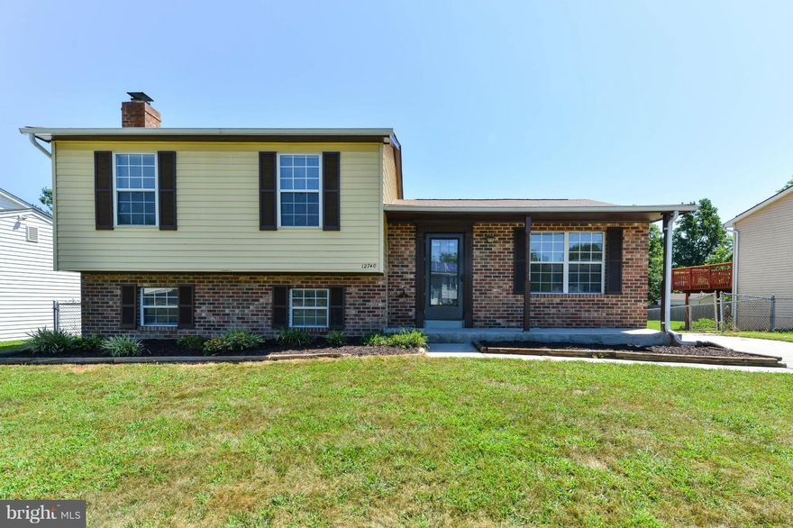 Fabulous split level offering three bedrooms, two and a half full baths, great location backing to common area.  Sunny open floor plan has newer kitchen with granite counters, stainless appliances, updated baths, new carpeting and new laminate flooring,  Completely fenced-in yard, private rear deck plus two-car detached garage with workshop and separate office space.