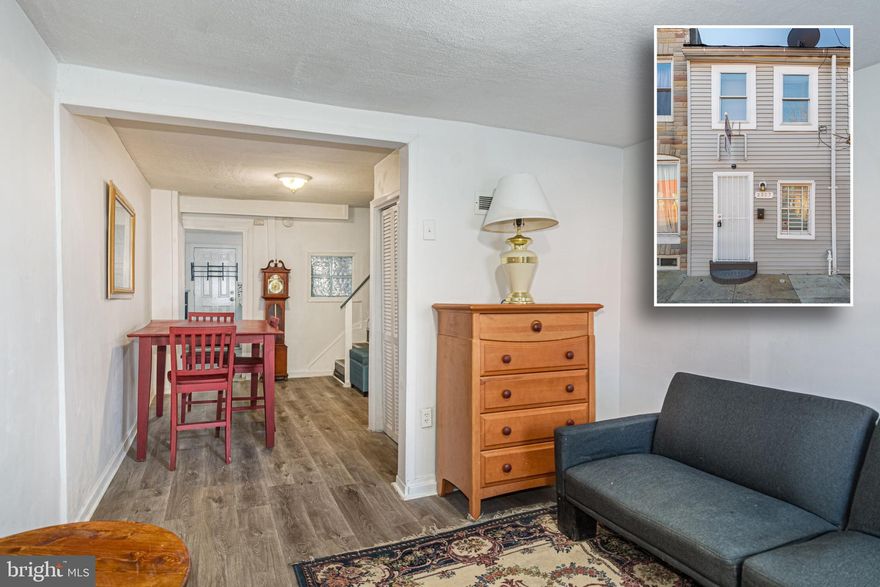 TURN KEY ROWHOME CONVENIENTLY LOCATED CLOSE TO JOHNS HOPKINS AND PATTERSON PARK! Features include wood laminate floors throughout, a spacious living room with dining area, kitchen w/ rear access to large fenced yard, and upper level with 2 bedrooms and 1 full bath.  Sold As-Is!