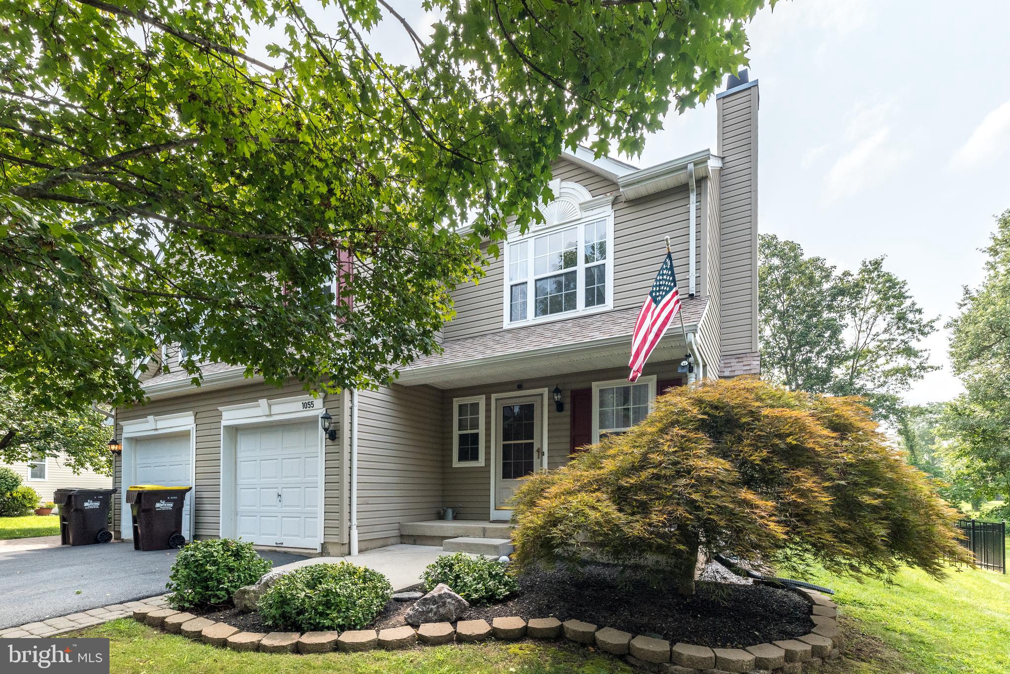 This well-maintained twin home is ideally located on a quiet cul-de-sac and offers 3 bedrooms and 2.5 bathrooms, with thoughtful upgrades throughout. The main level features a cozy living room with a gas fireplace, an upgraded powder room, and an inviting covered front porch with an expanded, upgraded walkway. The kitchen is enhanced with beautiful porcelain tile flooring and newer appliances. Upstairs, you'll find comfortable bedrooms and a fully updated hall bathroom. The spacious 19' x 13' deck—complete with lighting—overlooks a private, fenced backyard, perfect for relaxing or entertaining. Additional highlights include a newer HVAC system, new washer and dryer, water softener, ceiling fans, updated lighting, and an attached one-car garage. With style, comfort, and convenience all in one, this home offers peaceful living with modern upgrades in every corner.