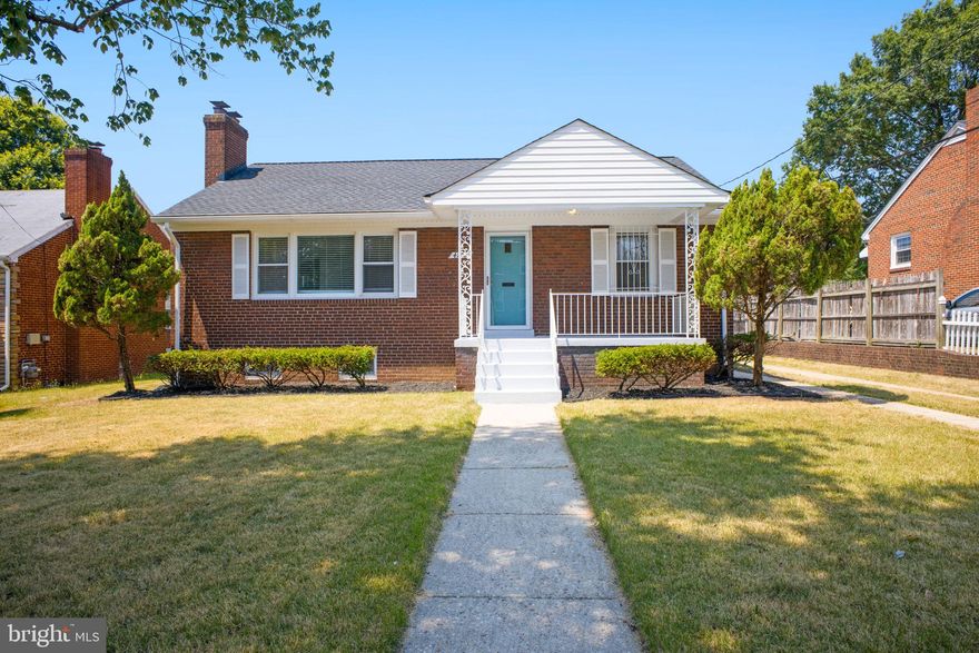 Welcome to North Woodridge! This completely remodeled brick home on the DC line is a must see. This home boasts a brand new open concept kitchen, huge family room with fireplace, hardwood flooring on main level, new carpet on lower level, detached  garage, and off street parking for 4 vehicles. Fire up the BBQ - the extremely spacious back yard is perfect for entertaining.  Nearby parks include Mount Rainier Neighborhood Park, Barnard Hill Park and Barnard Hill. This move in ready home is close to the green & yellow line metrorail, has a metro bus stop right at the corner, and is convenient to a variety of shops. OPEN SUNDAY, JUNE 30, 2024 from 1PM to 3PM. Grab your agent and go!