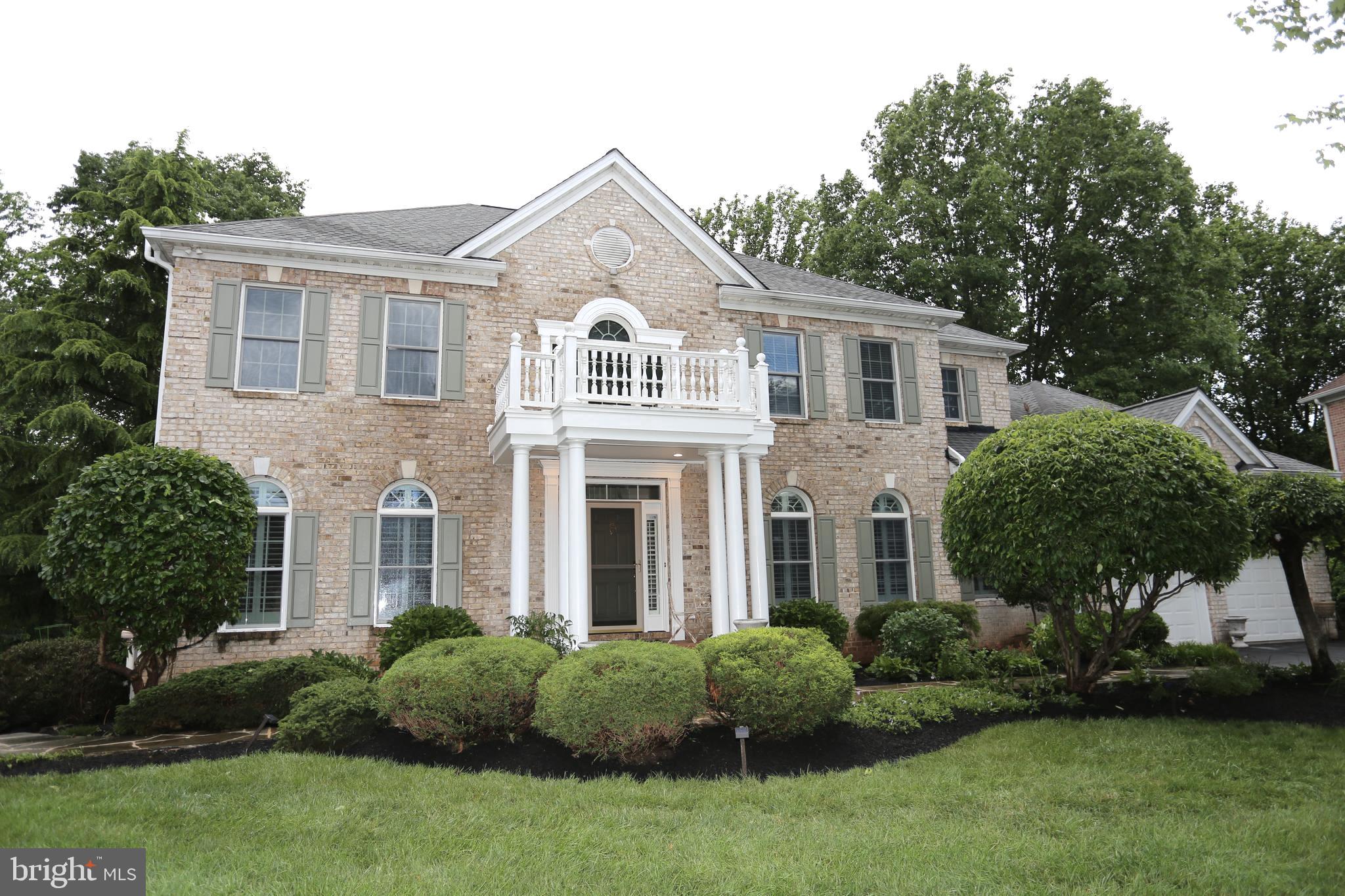 Golf Island at Turf Valley Vistas – Where Elegance Meets Tranquility.
Nestled in the prestigious Turf Valley Resort—one of Ellicott City’s most desirable communities—this all-brick colonial masterpiece offers breathtaking views of the lush golf course and a serene backdrop of mature, towering trees.
This custom-built, light-filled home features six spacious bedrooms (four on the upper level, two on the lower level), five luxurious full baths, and two elegant half baths on the main level. Three beautifully designed fireplaces with glass doors create cozy focal points in the family room, primary suite, and expansive lower-level recreation room. The property also includes a 3-car garage with additional space for storage or hobbies.
Designed for both everyday comfort and grand entertaining, the open-concept floor plan showcases a stunning sunroom with an arched picture window and double French doors. The sunroom flows seamlessly past a stylish wet bar in the family room and opens to an oversized deck. The walk-out lower level leads to a flagstone patio, all overlooking manicured landscaping that creates a private, resort-like atmosphere—ideal for entertaining or quiet relaxation.
Recent upscale renovations include:
Refinished and new hardwood floors throughout the main and upper levels, including both staircases (2025)
Modern kitchen with brand-new cabinetry and countertops (2025)
Luxuriously updated primary bath and significant upgrades to all additional full bathrooms (2025)
New HVAC systems: main level (2017), upper level (2019)
New 75-gallon hot water heater (2024)
Roof replacement (2017)
Additionally, the home is covered by a ShieldComplete Plan from American Home Shield, offering the highest level of protection for added peace of mind.
With its timeless elegance, thoughtful updates, and unmatched setting, this exceptional residence defines luxury living in Turf Valley.