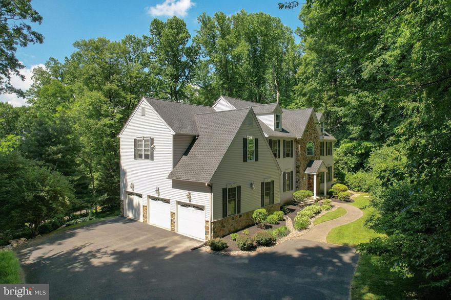 Welcome to this custom built, expansive, four-bedroom, two full bath, and two half bath home, nestled on a private 1.6-acre wooded lot. Offering over 4,400 square feet of living space, this home is designed for both comfort and functionality. The open, inviting floor plan features generous living areas, perfect for both everyday living and entertaining. The chef's kitchen boasts ample cabinetry, modern appliances, and a large center island, making meal prep a breeze. A spacious living room with large windows allows natural light to flood the home, creating a warm and inviting atmosphere. The finished basement with fireplace adds even more living space, perfect for a home theater, gym, or playroom. The primary suite is a true retreat, featuring a private bath with double vanities, a soaking tub, and a separate shower. Three additional bedrooms provide plenty of space for family or guests. Outside, enjoy the serene beauty of your 1.6-acre lot, offering plenty of space for outdoor activities or simply relaxing on the back deck. The home also features a three-car garage, providing ample storage and parking. Located in the sought after Downingtown Area School District, this home is just minutes from local shopping, dining, and major highways, making commuting a breeze.