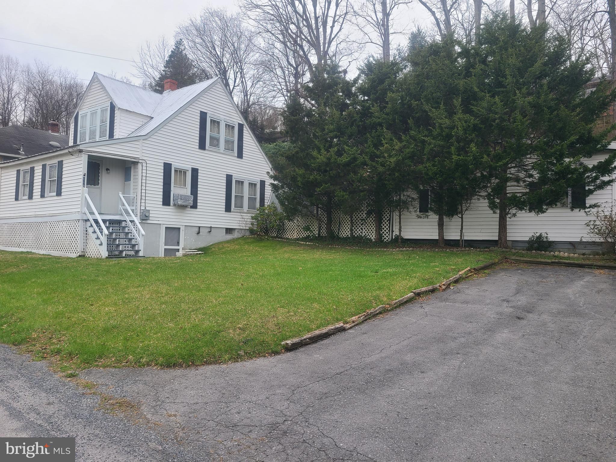 Home needs TLC especially the basement, but could be a great rental or first time home. 2 BR & 1 Bath up. Main level has 1 Bath also. Close to downtown Berkeley Springs. Selling As Is. No Repairs